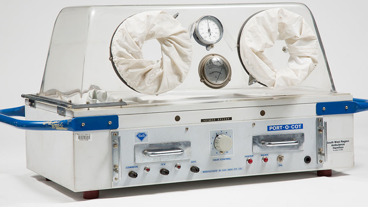 A medical device featuring two large holes for hand insertion.